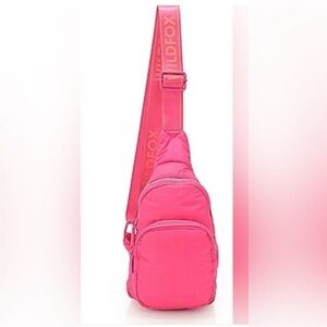 Wildfox Vibrant Pink Crossbody Bag. Bright pink padded travel sling bag